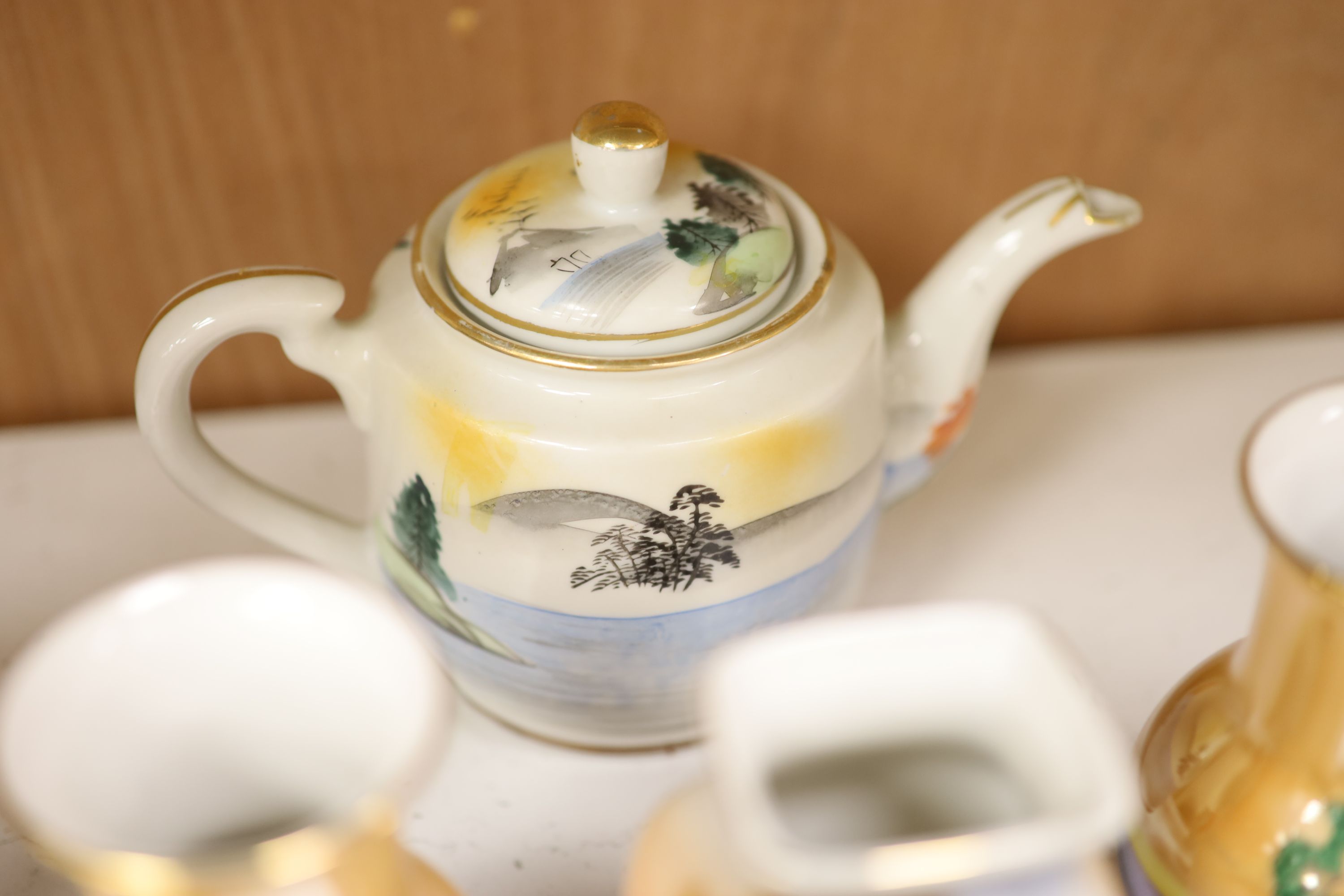 A quantity of Oriental and Oriental style porcelain including Satsuma and Noritake